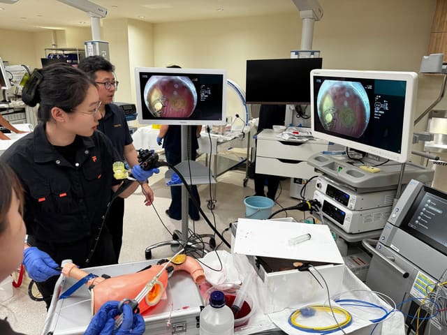Chloe Zhang taking part in an endoscopy training exercise with a model at the Tan Tock Seng Hospital workshop